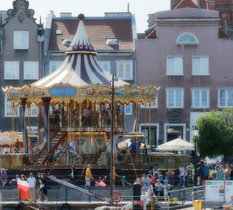 21 - The popular Gdańsk Carousel, a two-level, vintage-style merry-go-round located on the Motława River embankment in the heart of Gdańsk's Old Town